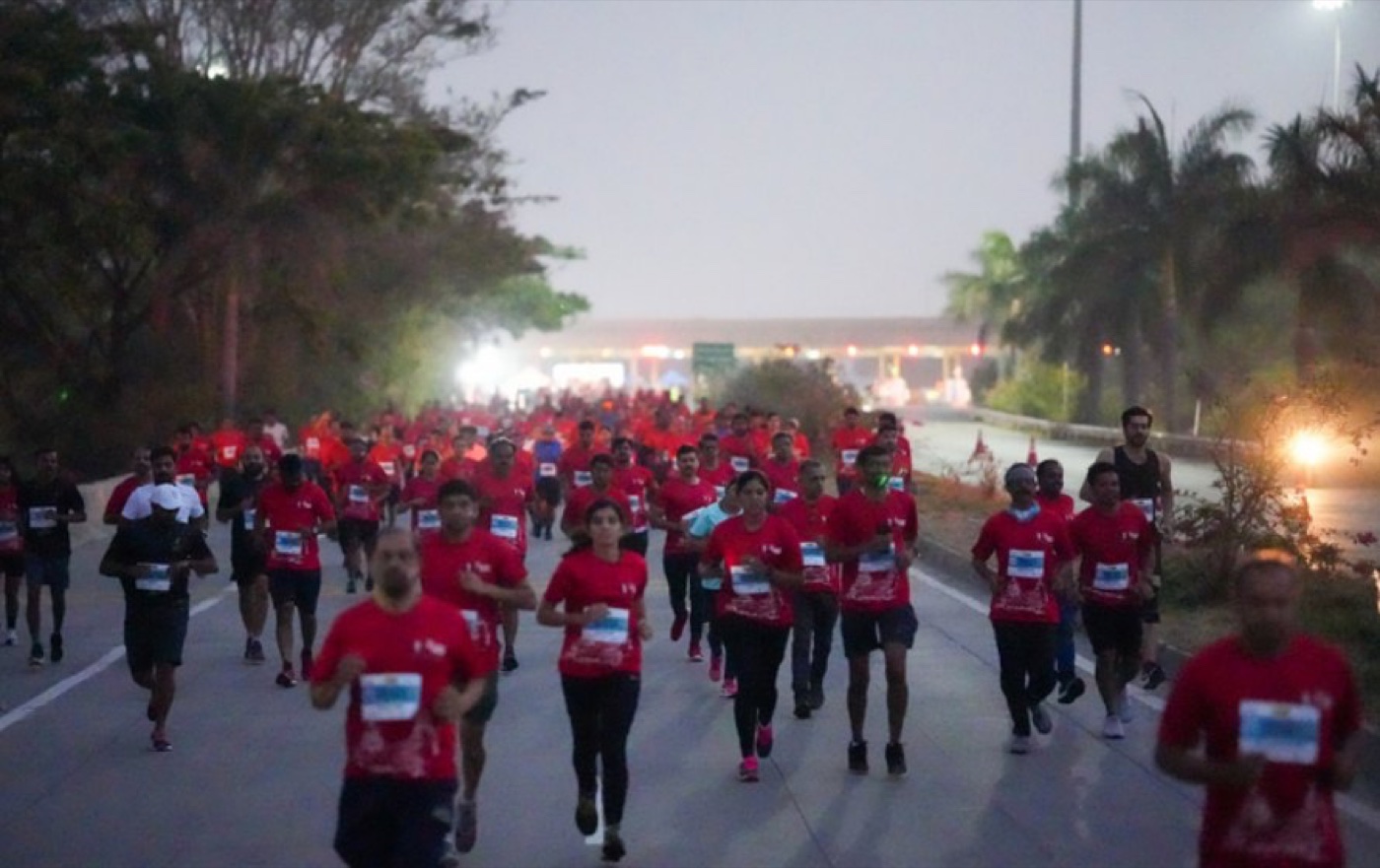 Runners on the road at dawn
